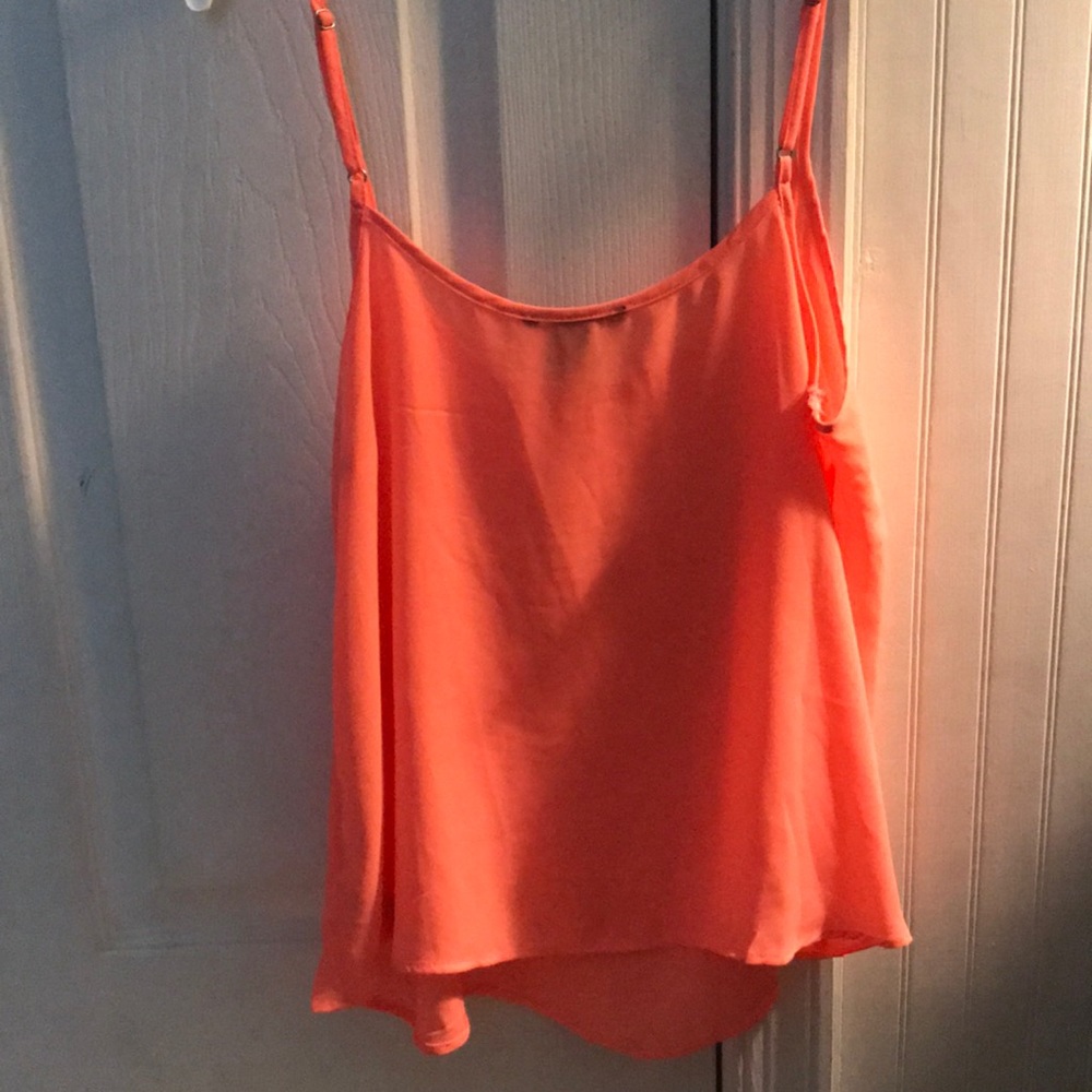 Peach colored flowy tank
